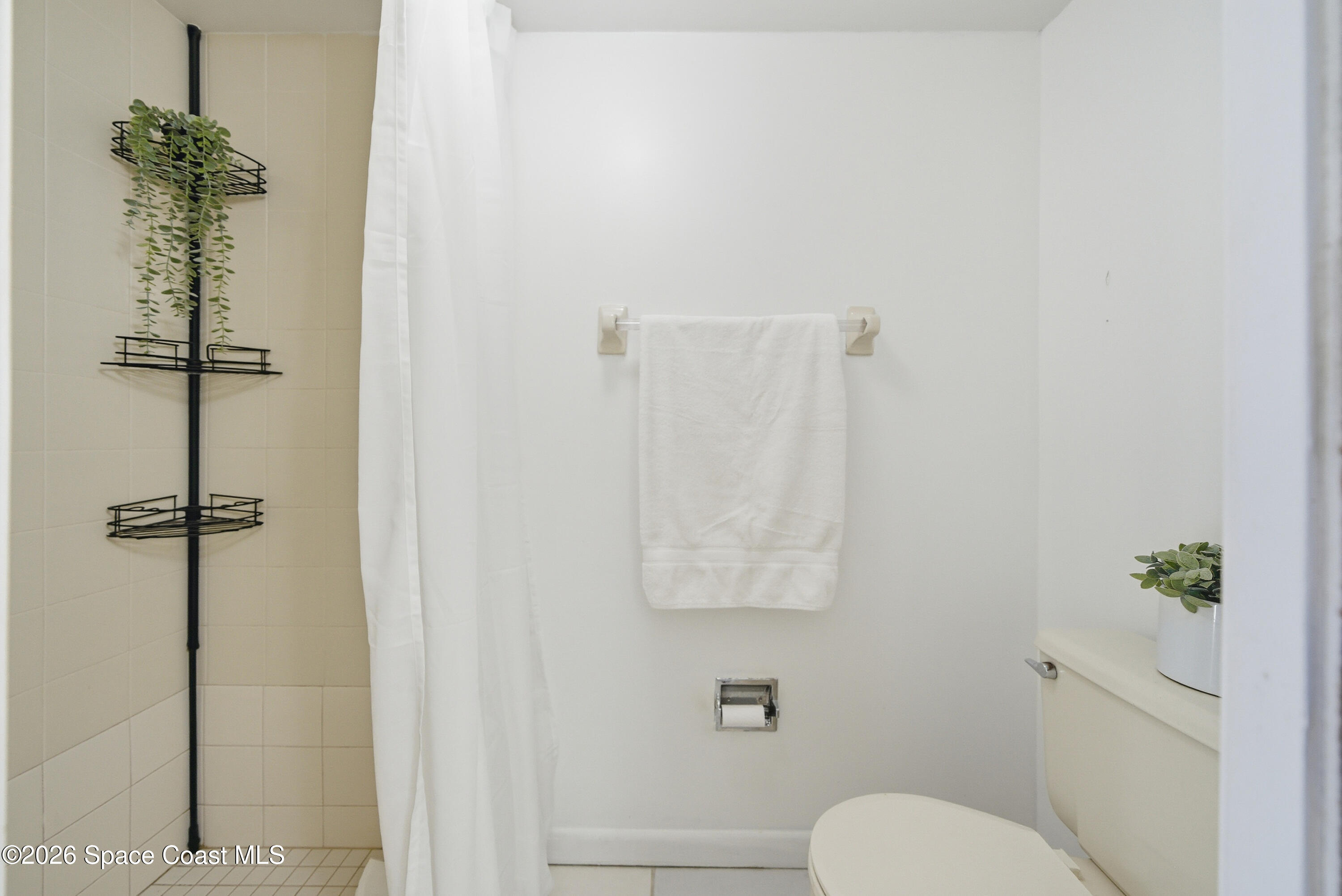 6850 Highway 1, Unit 5204 Grant, FL 32949 - Photo 18 of 33 a bathroom with a toilet