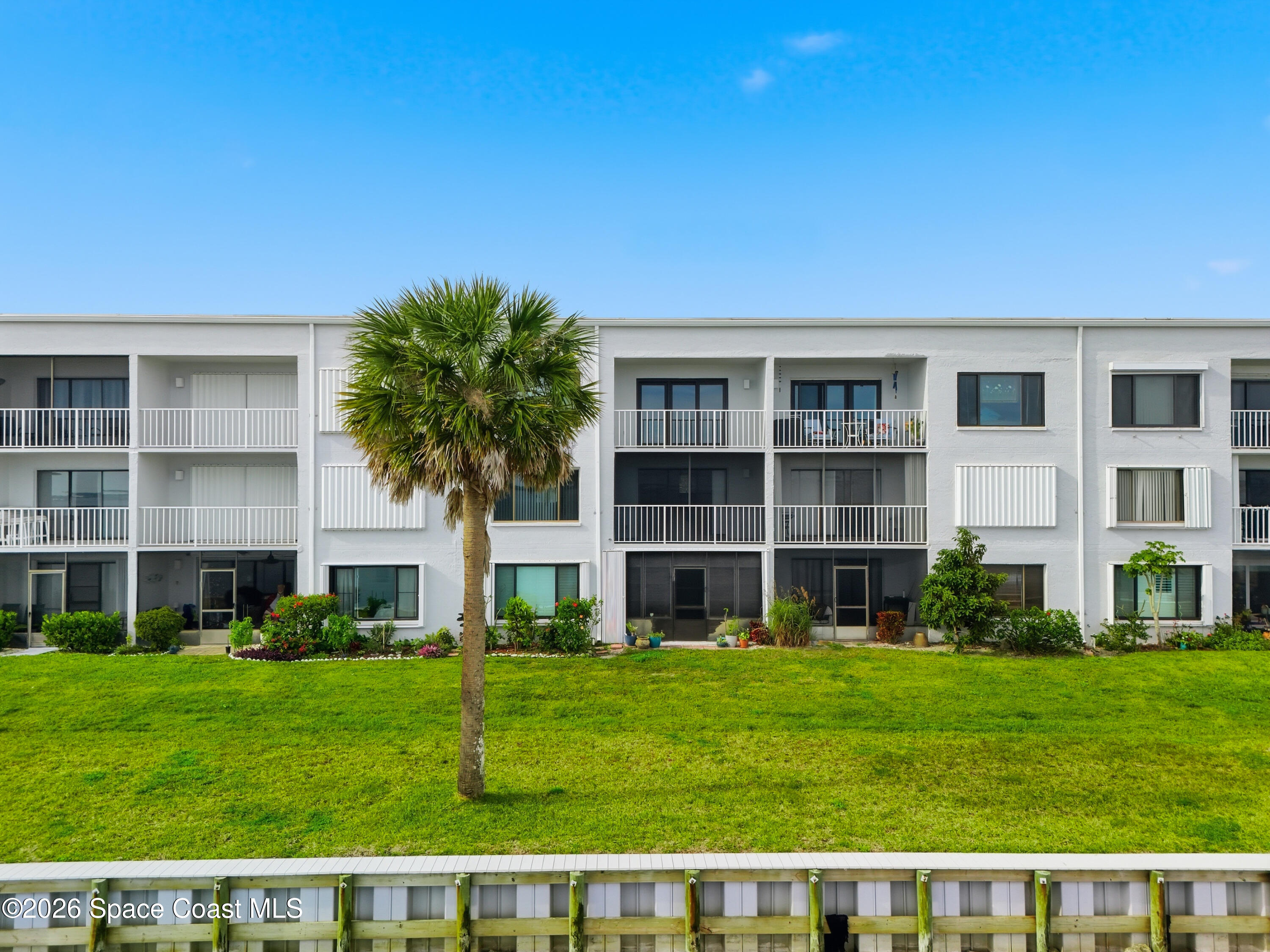 6850 Highway 1, Unit 5204 Grant, FL 32949 - Photo 28 of 33 a view of house with backyard