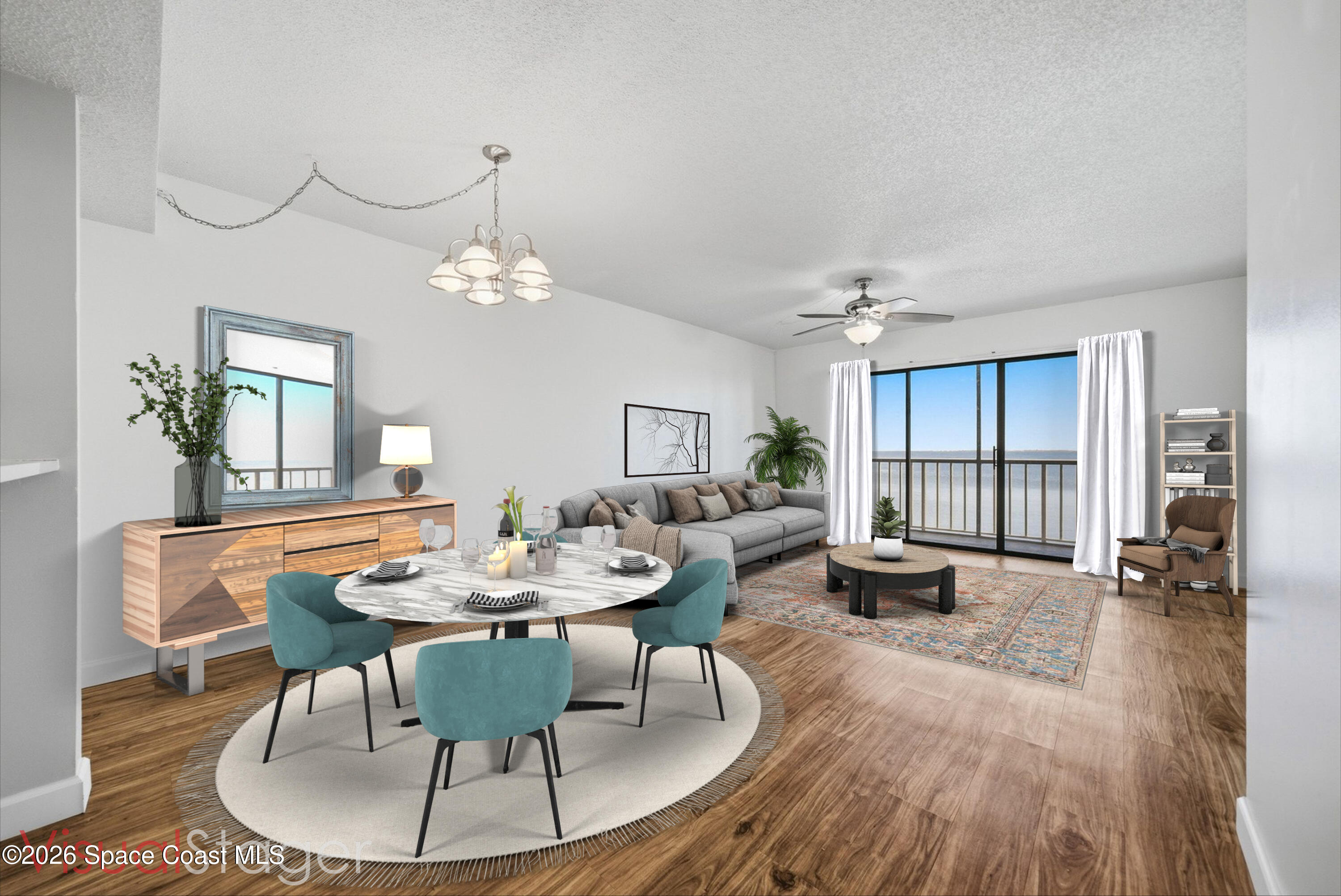 6850 Highway 1, Unit 5204 Grant, FL 32949 - Photo 6 of 33 a view of a dining room with furniture wooden floor and chandelier