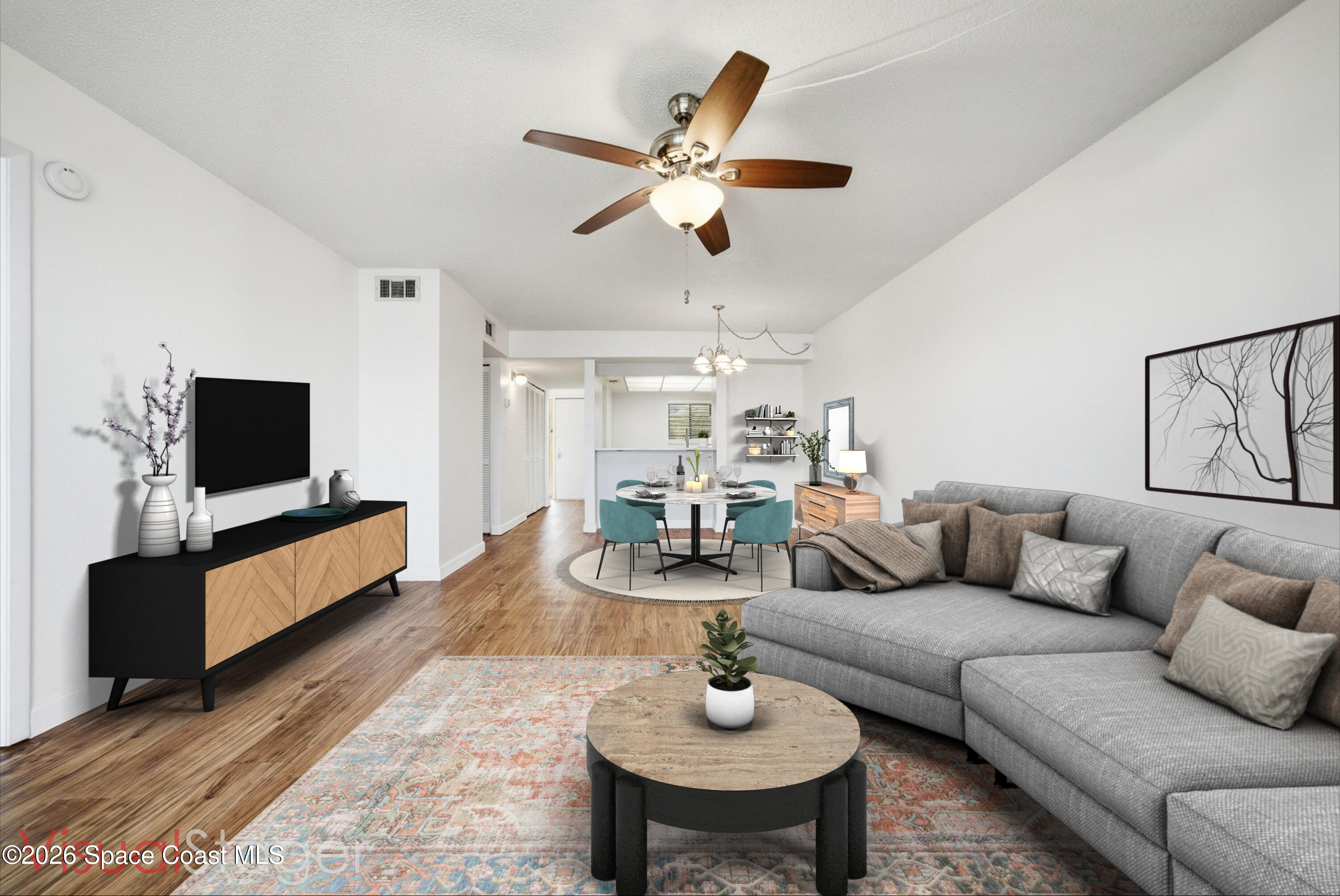6850 Highway 1, Unit 5204 Grant, FL 32949 - Photo 9 of 33 a living room with furniture and a flat screen tv