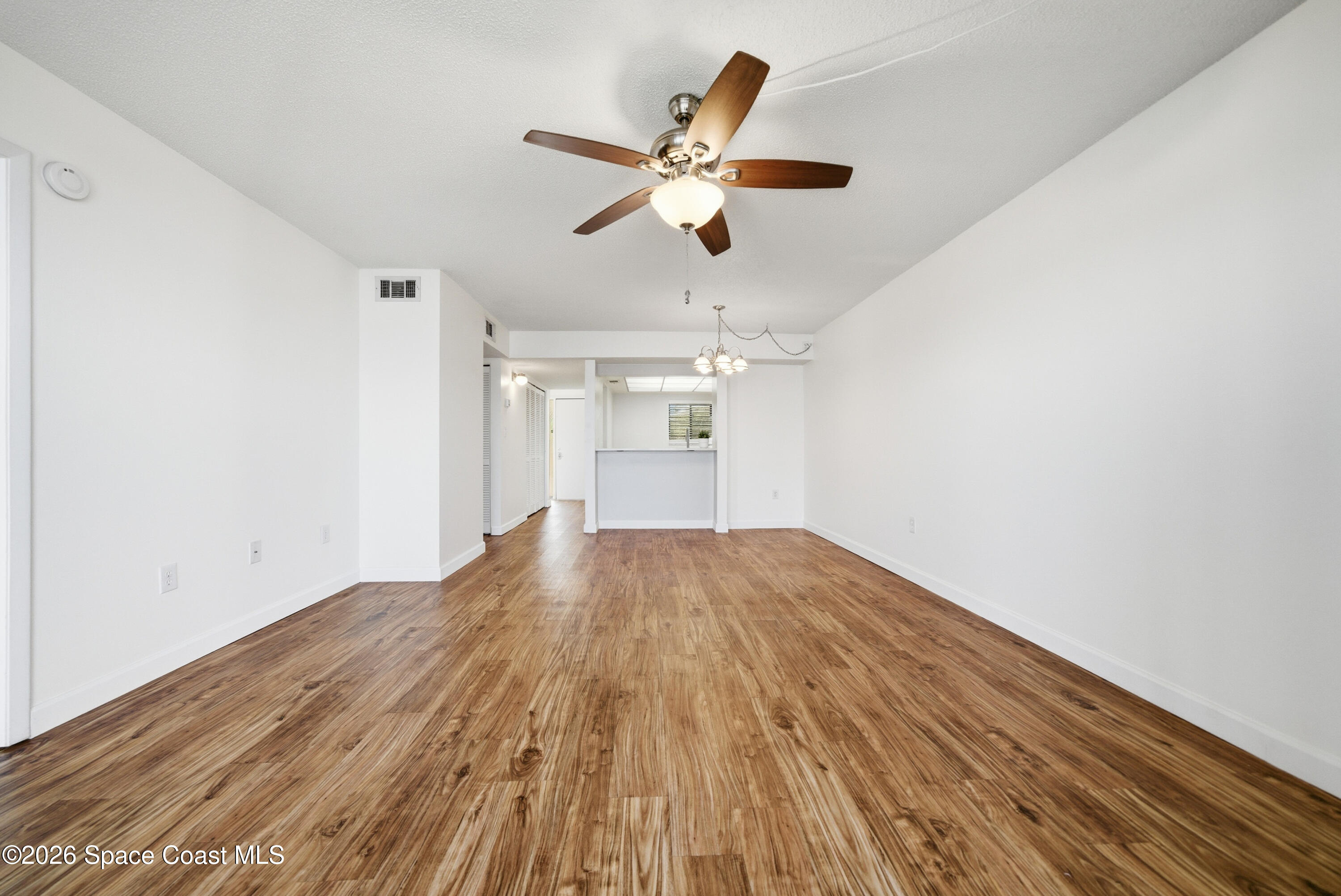 6850 Highway 1, Unit 5204 Grant, FL 32949 - Photo 10 of 33 a view of empty room with wooden floor
