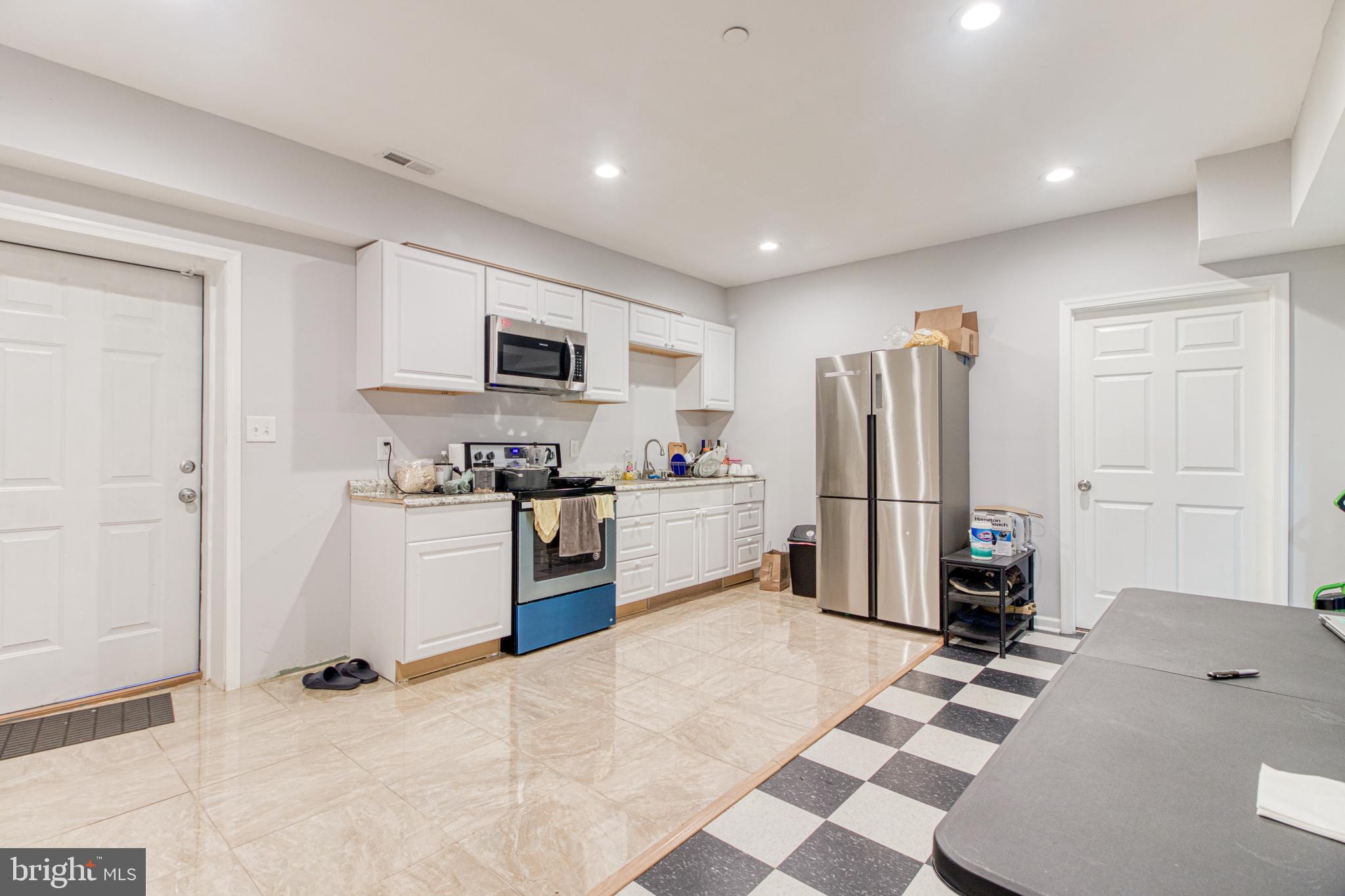 1327 Smith Village Road Silver Spring, MD 20904 - Photo 26 of 33 Kitchen and dinning area in the basement
