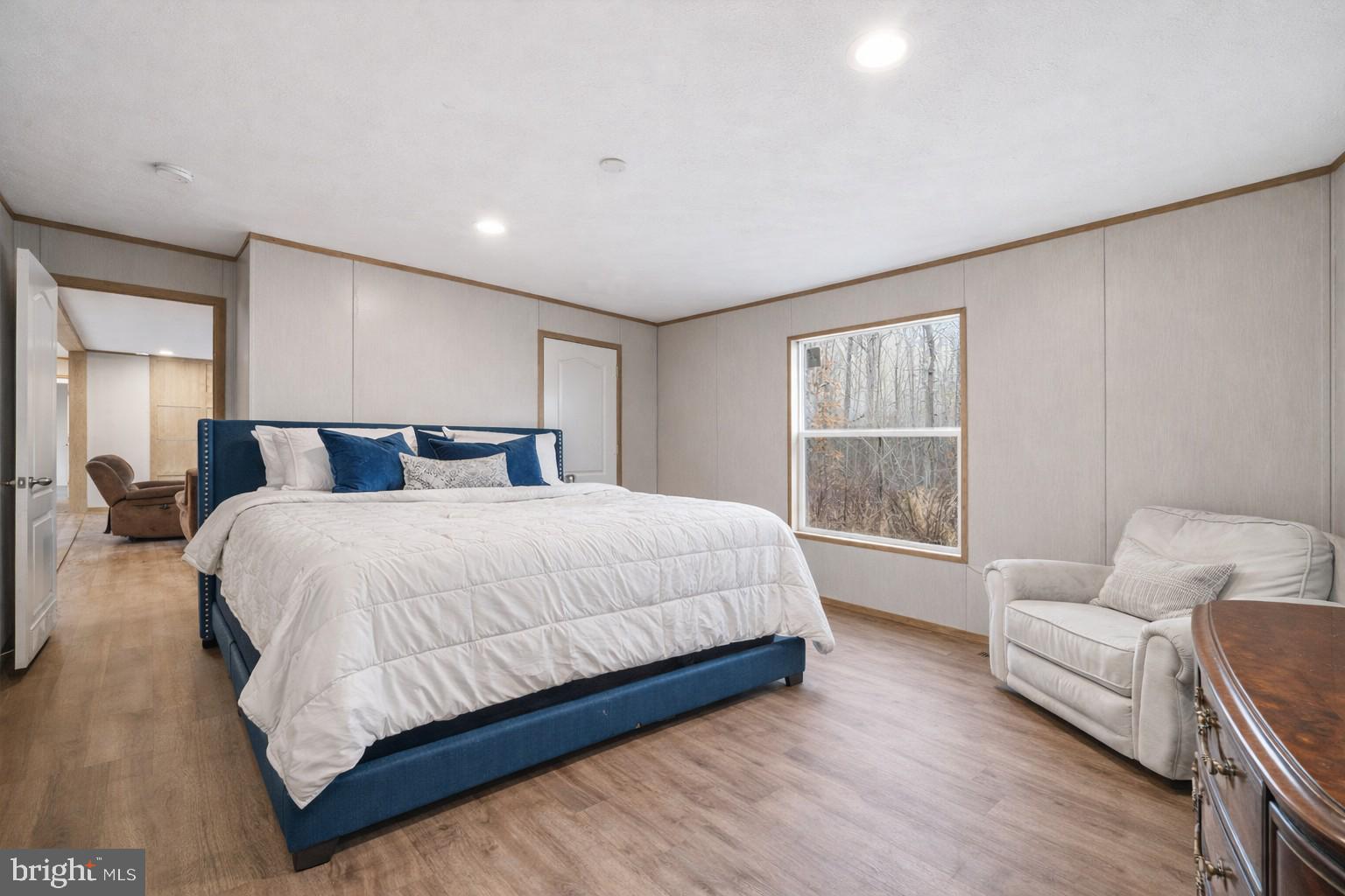 15075 Madison Run Road Gordonsville, VA 22942 - Photo 15 of 23 a bedroom with a large bed and a couch