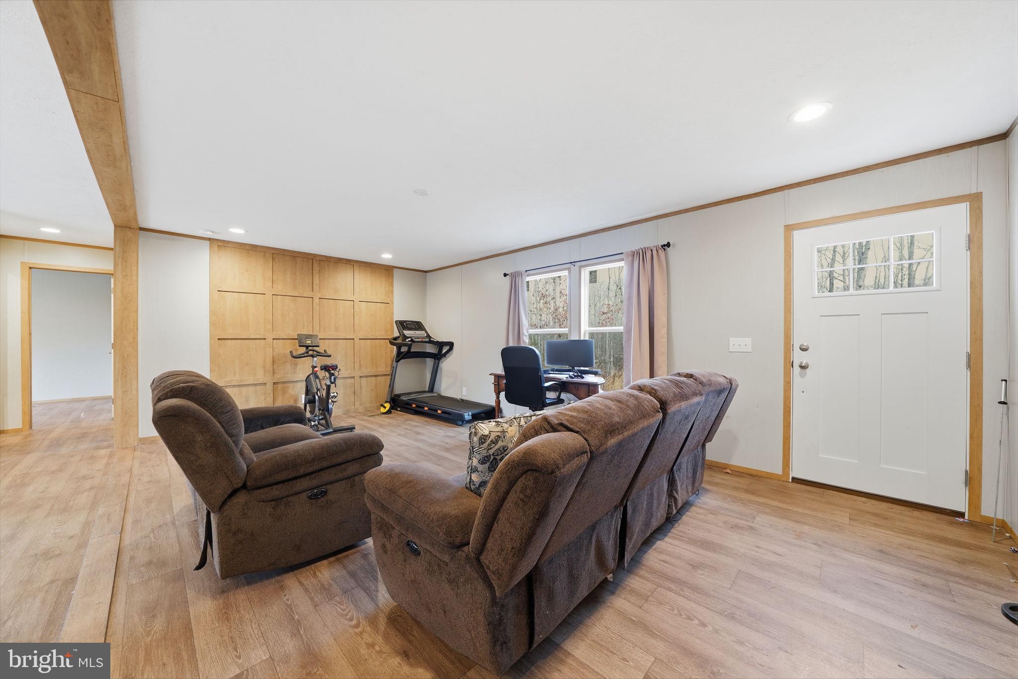15075 Madison Run Road Gordonsville, VA 22942 - Photo 3 of 23 a living room with furniture and a wooden floor