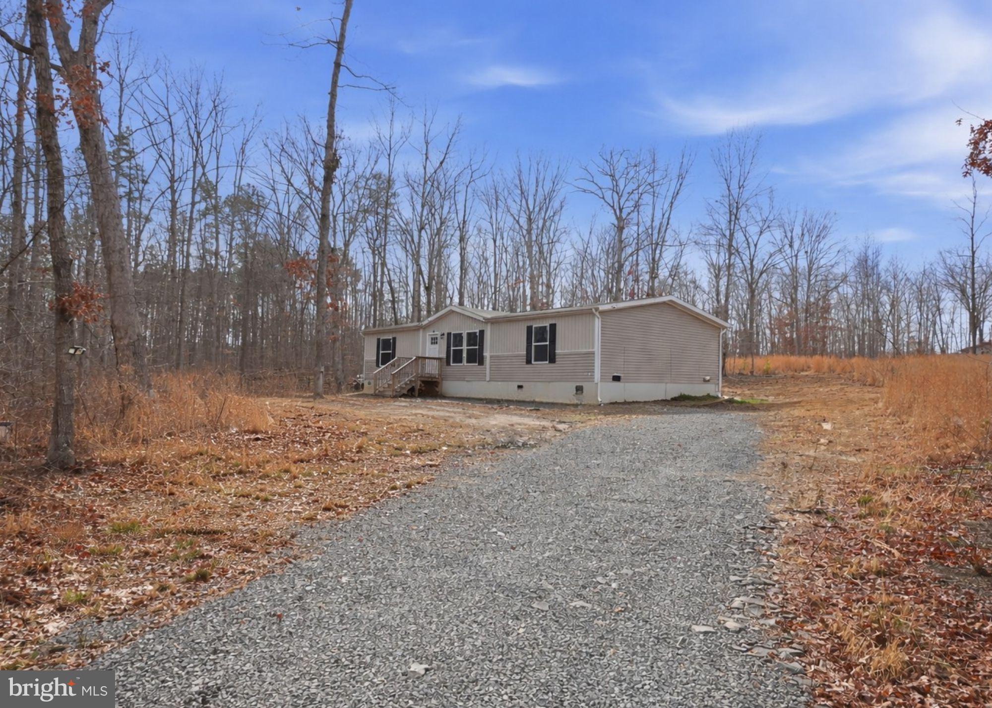 15075 Madison Run Road Gordonsville, VA 22942 - Photo 5 of 23 a view of a barn with green space