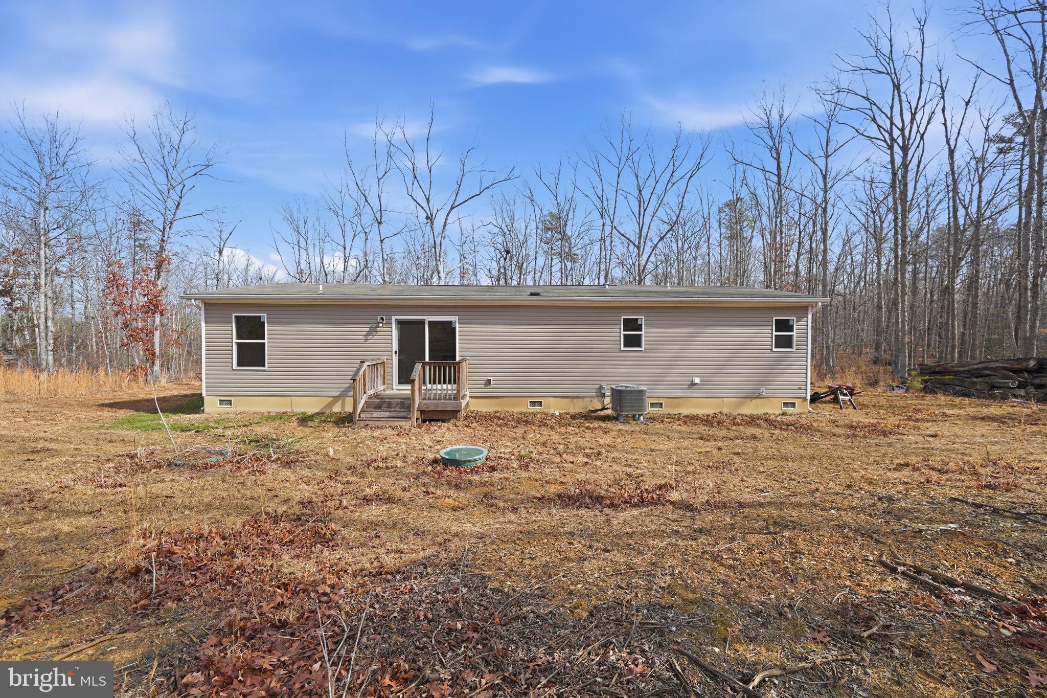 15075 Madison Run Road Gordonsville, VA 22942 - Photo 6 of 23 front view of a house with a yard