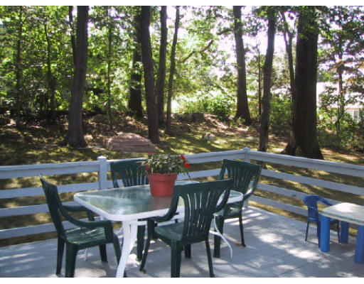 2 Virginia Road Waltham, MA 02453 - Photo 2 of 8 a view of an outdoor space with table and chairs