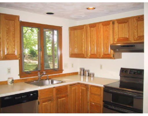 2 Virginia Road Waltham, MA 02453 - Photo 3 of 8 a kitchen with granite countertop a sink and a stove top oven