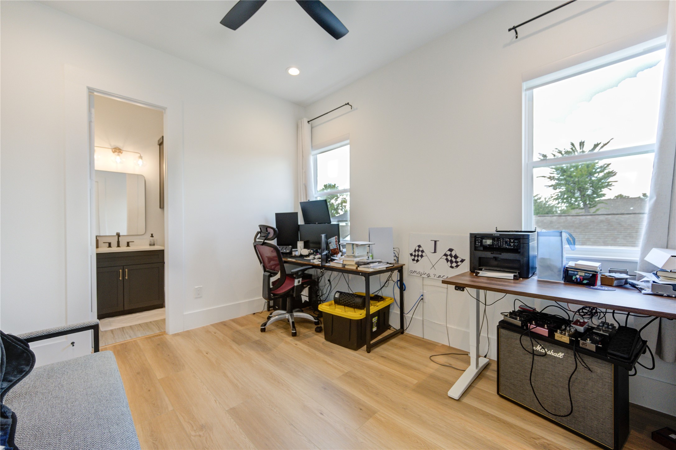 18 Sidney Street, Unit A Houston, TX 77003 - Photo 22 of 30 a view of a workspace with furniture and a window