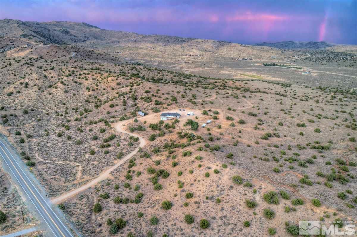 14007 North Red Rock Road Reno, NV 89508 - Photo 17 of 36 a view of a yard with a mountain