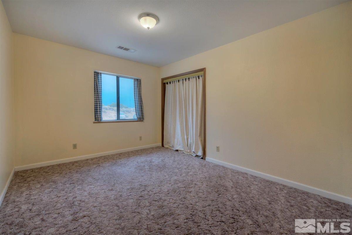 14007 North Red Rock Road Reno, NV 89508 - Photo 33 of 36 an empty room with windows