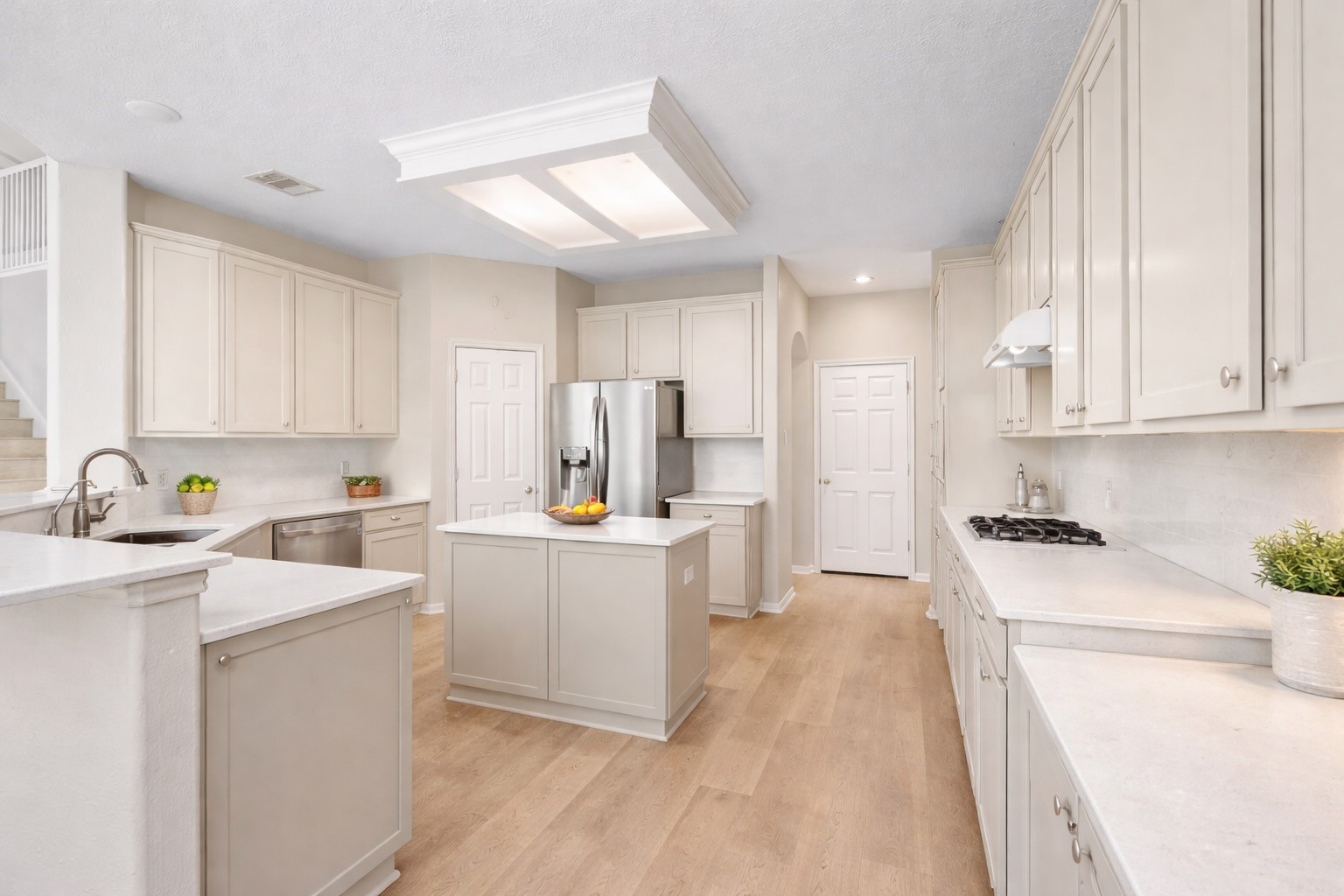 6507 Quiet Pointe Drive Spring, TX 77389 - Photo 11 of 46 Seller has already invested in custom kitchen cabinets for a planned remodel, offering a great opportunity for the next owner to bring their vision to life. The cabinets are currently stored in the garage. This is a rendering showcasing the potential design and layout, giving a clear picture of what the finished kitchen could look like.