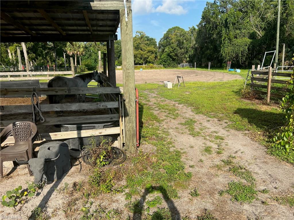 2170 Rock Road Naples, FL 34120 - Photo 9 of 15 a view of a backyard with sitting area