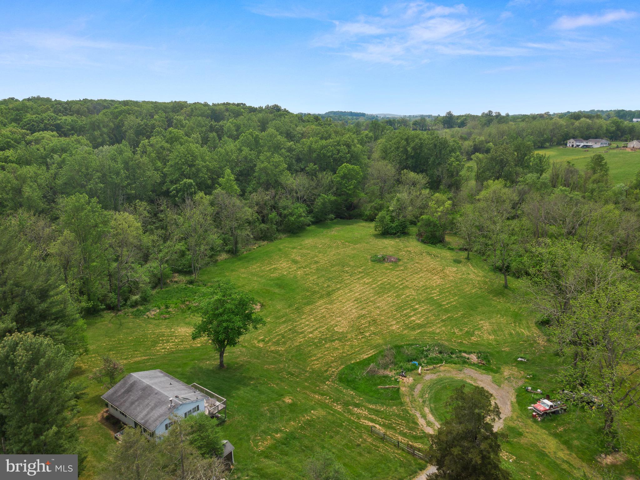 5.75 Acres with a Creek and two homes