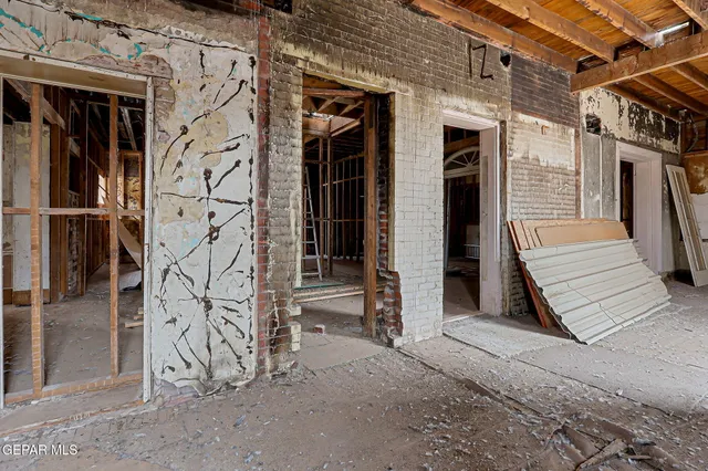 a view of a patio with wooden floor