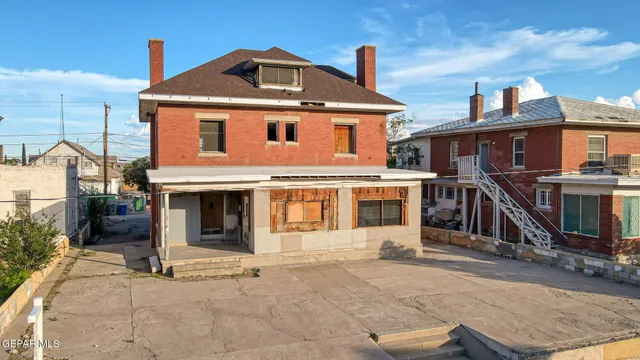 a front view of a house with glass windows