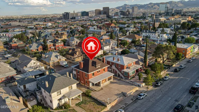 an aerial view of a city with lots of residential buildings