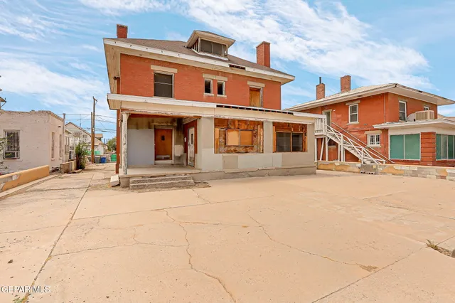 a front view of a house with a garage