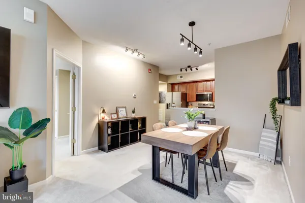 a view of a dining room with furniture