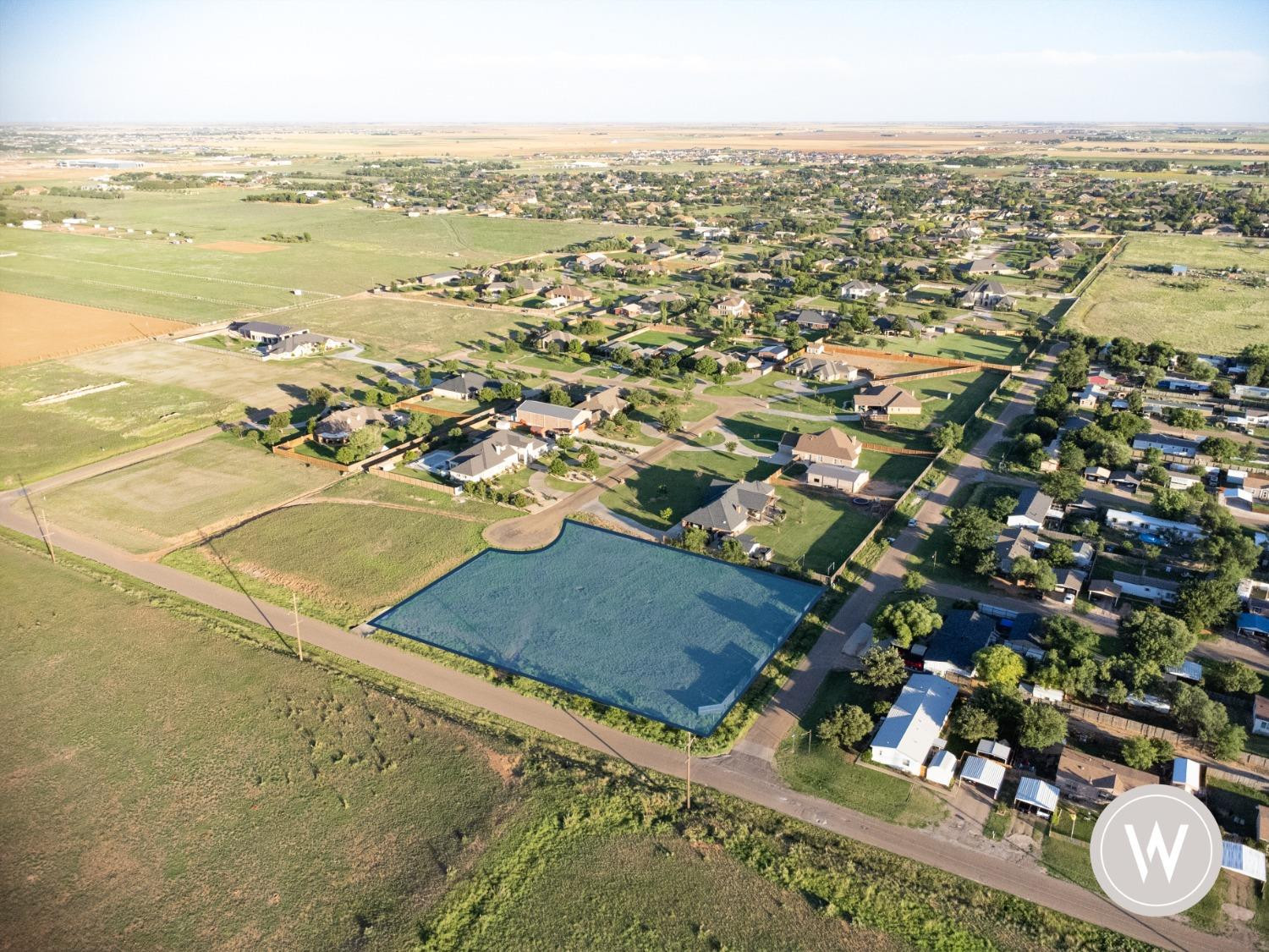 14602 County Road 1835 Lubbock, TX 79424 - Photo 2 of 5 an aerial view of residential building and lake