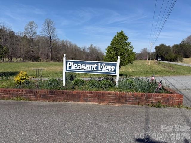 a sign that is on the side of a road