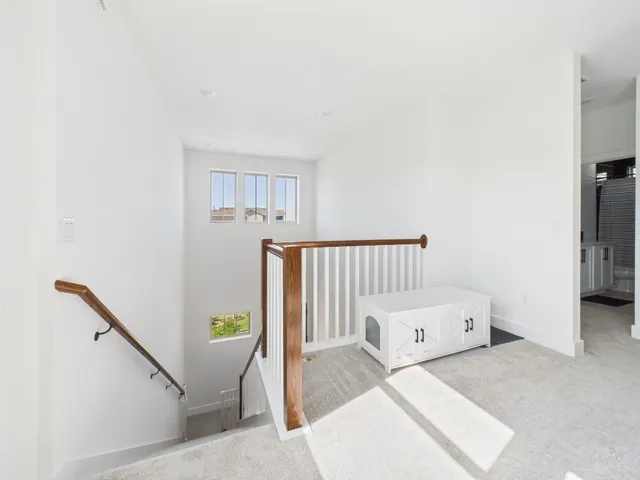 a view of livingroom with furniture and stairs