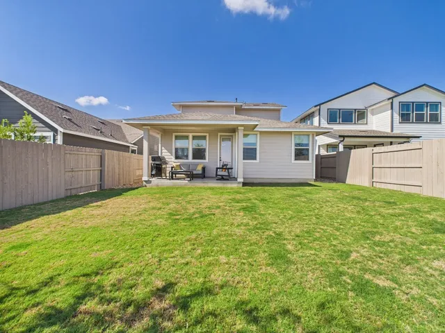 a view of a swimming pool with a lounge chairs