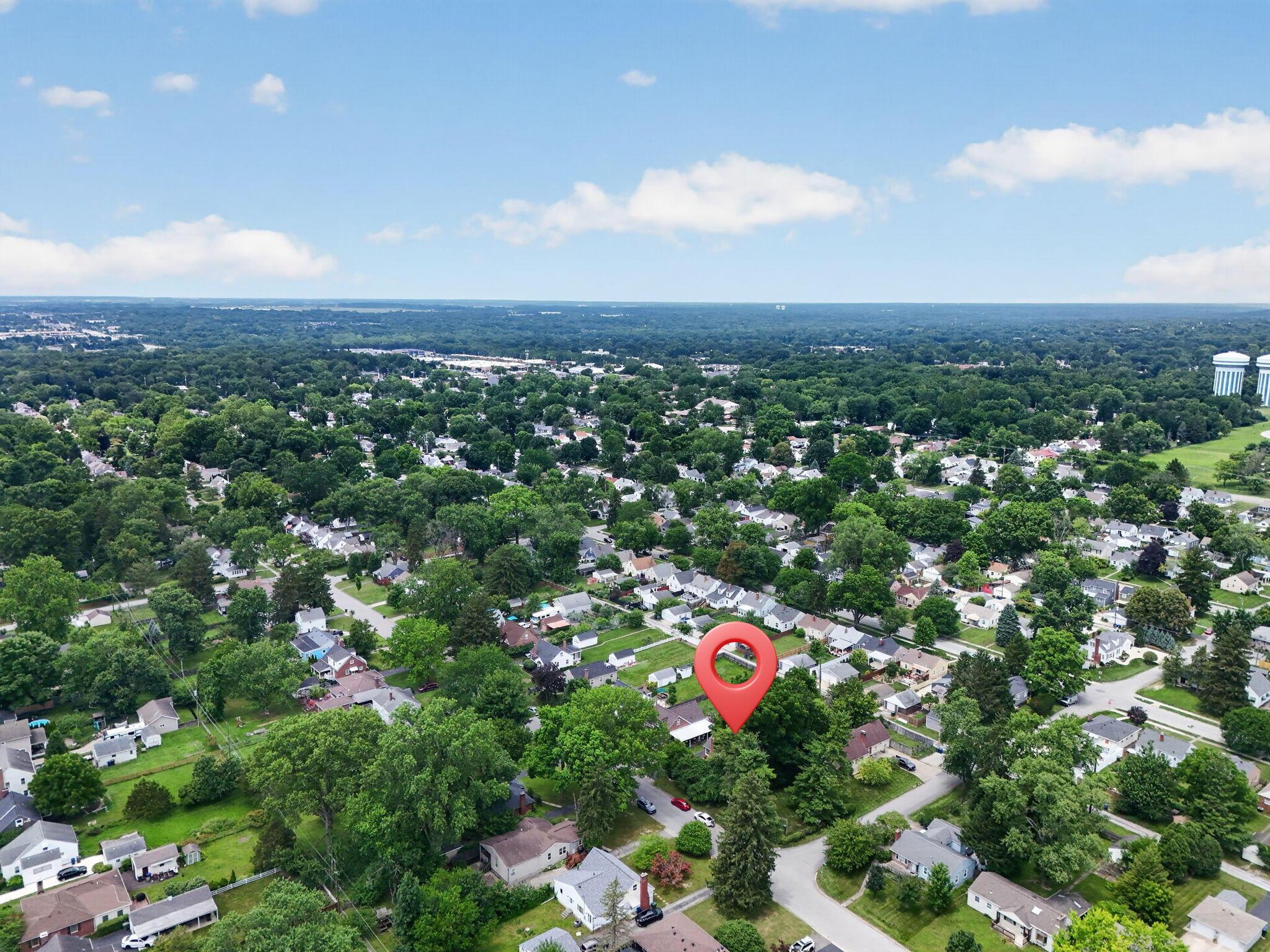 492 Wetmore Road Columbus, OH 43214 - Photo 50 of 55 Aerial perspective showcasing a residential neighborhood with abundant mature trees and a grid street pattern