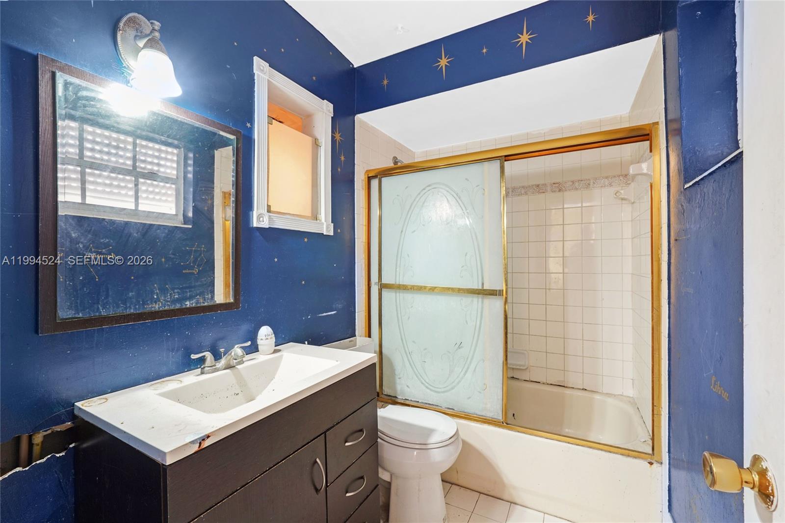 7205 West 2nd Lane Hialeah, FL 33014 - Photo 20 of 30 a bathroom with a sink toilet and shower