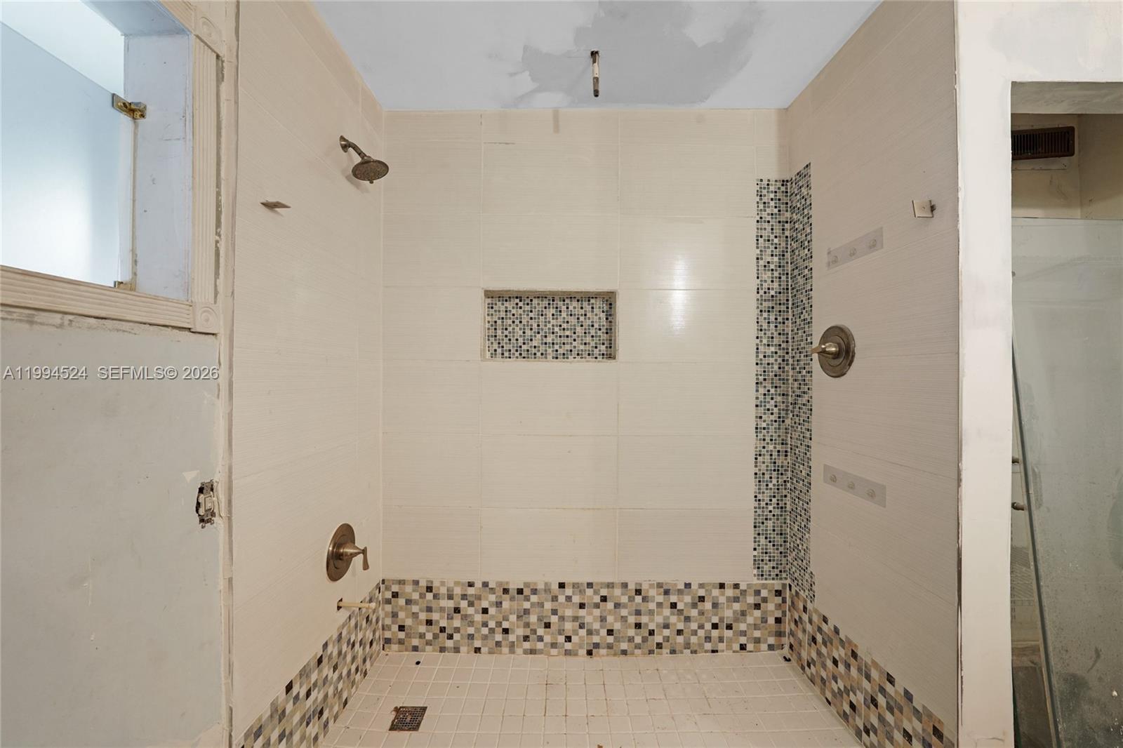 7205 West 2nd Lane Hialeah, FL 33014 - Photo 23 of 30 a bathroom with a shower