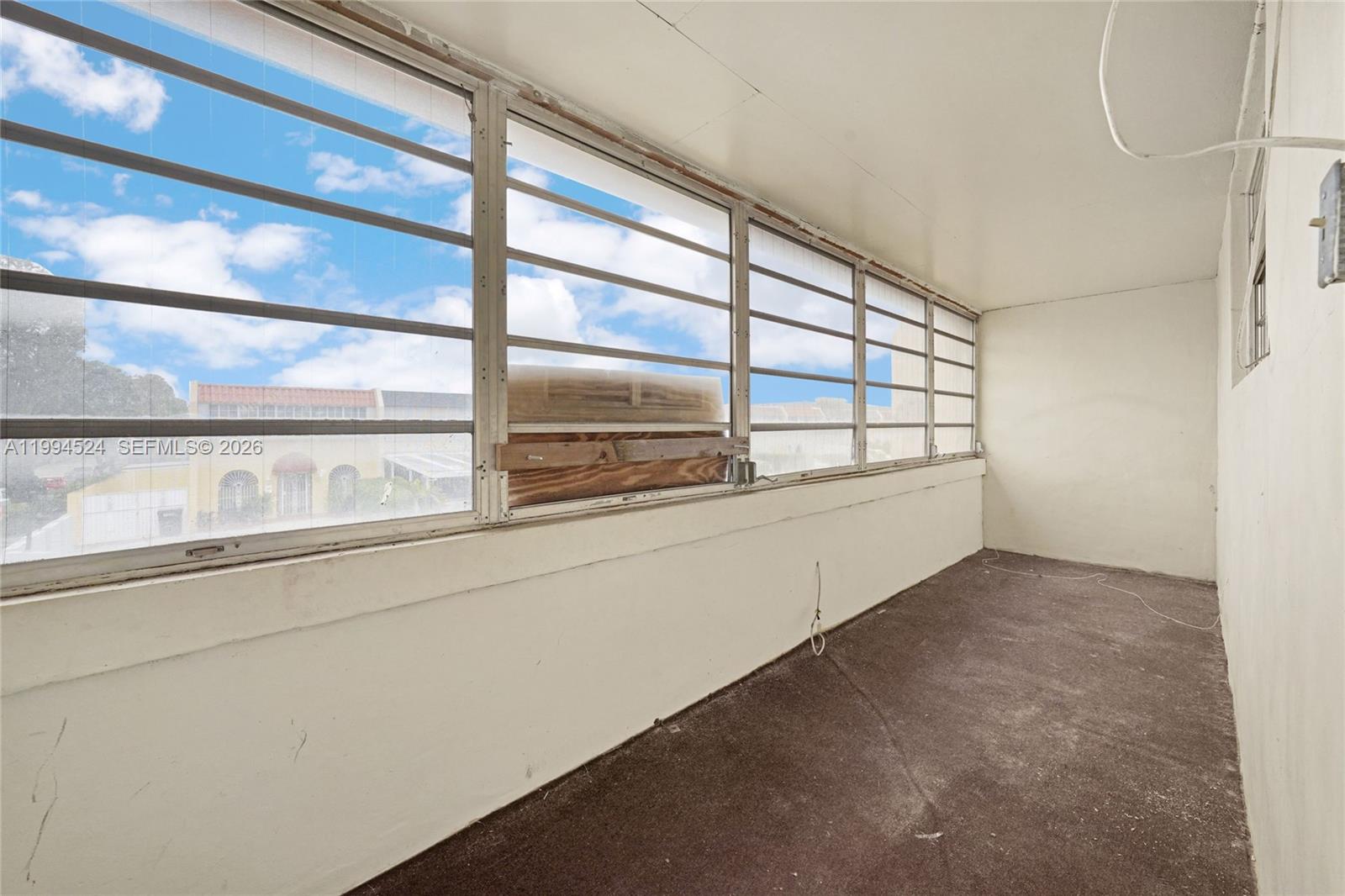 7205 West 2nd Lane Hialeah, FL 33014 - Photo 24 of 30 a view of empty room with window