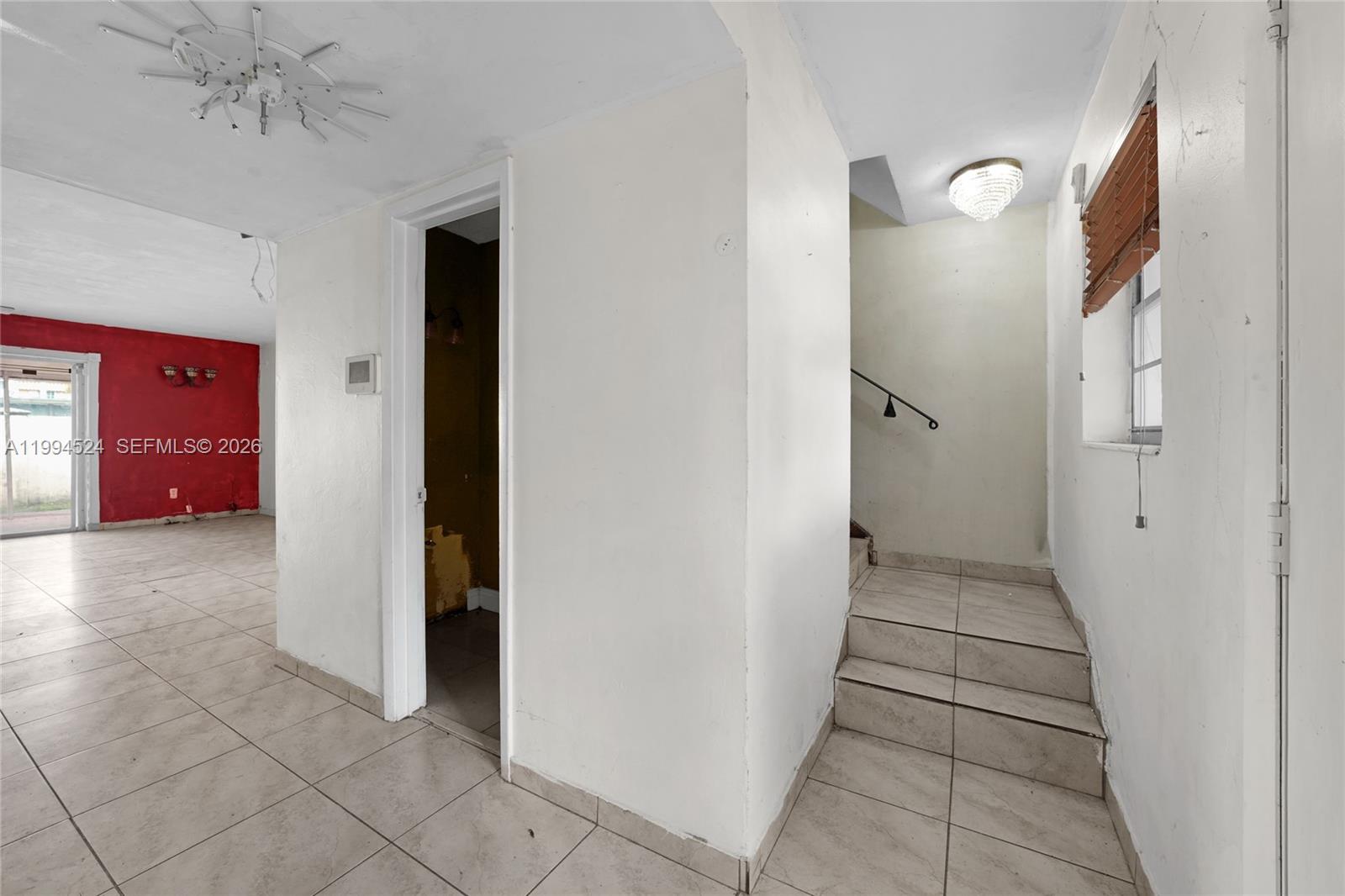 7205 West 2nd Lane Hialeah, FL 33014 - Photo 5 of 30 a view of a hallway with a elevator