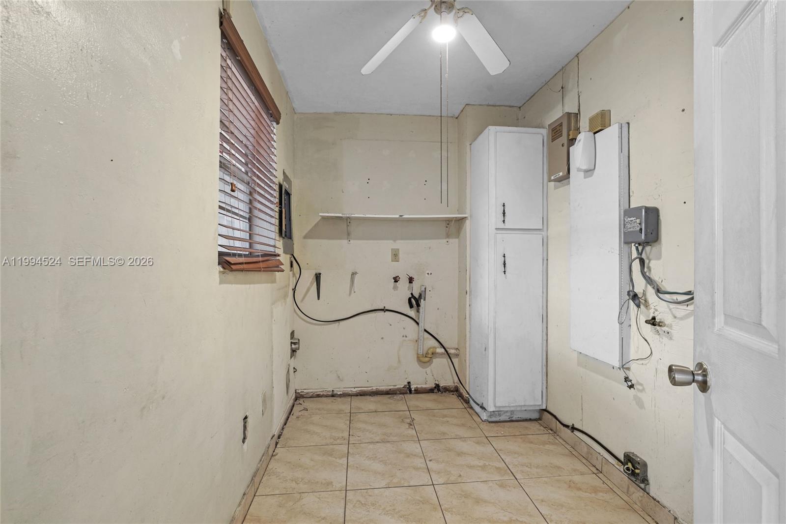 7205 West 2nd Lane Hialeah, FL 33014 - Photo 6 of 30 a bathroom with a shower