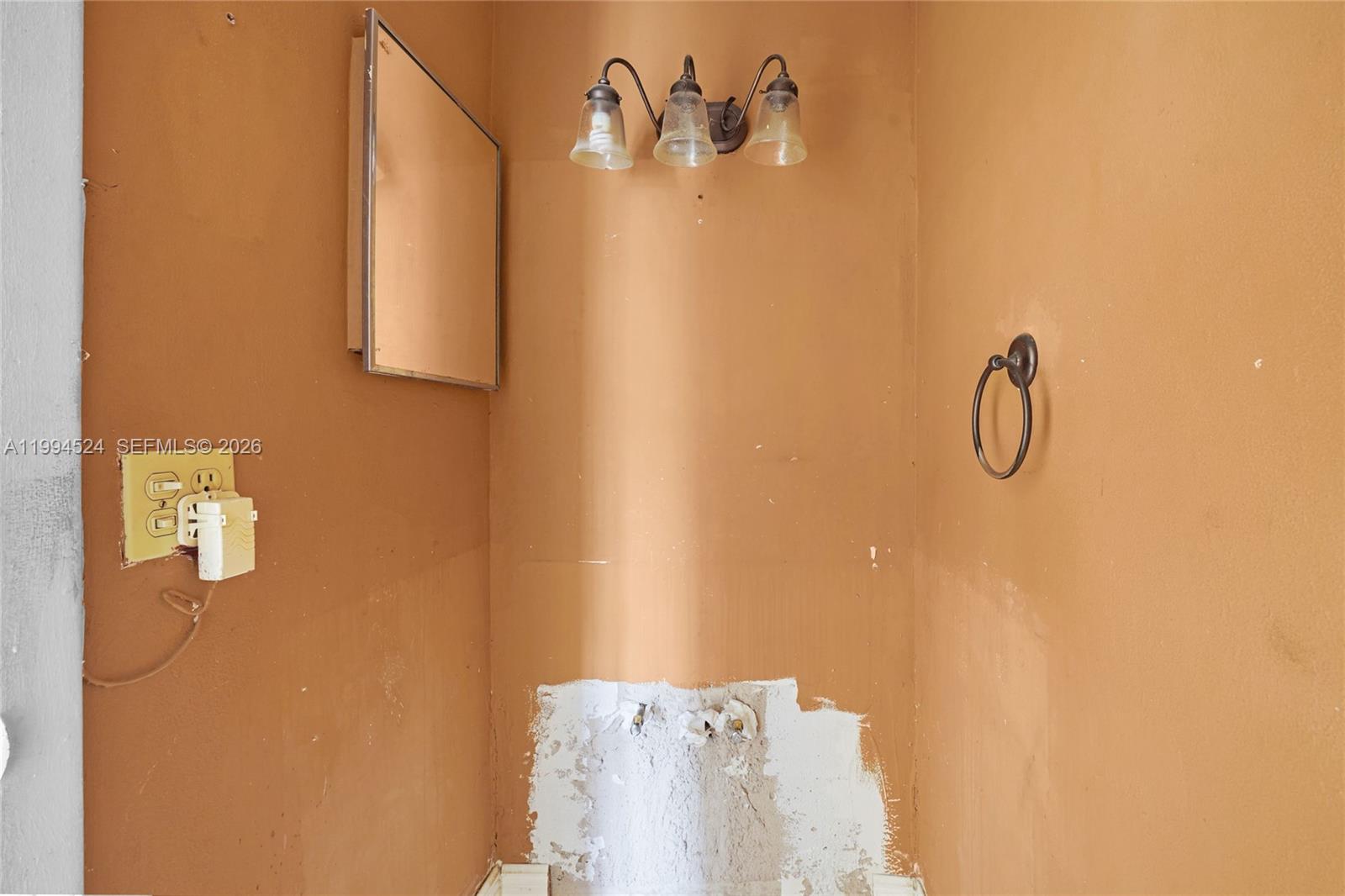 7205 West 2nd Lane Hialeah, FL 33014 - Photo 7 of 30 a bathroom with a shower