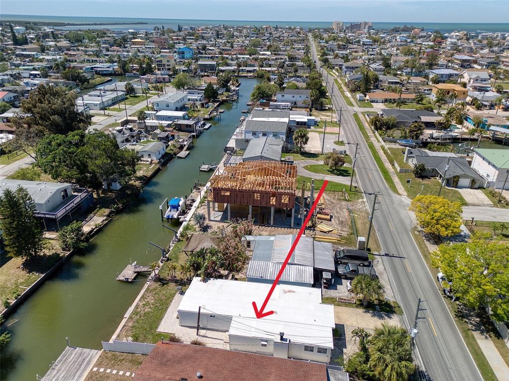 6820 Sea Ranch Drive Hudson, FL 34667 - Photo 24 of 29 an aerial view of a house with a ocean view