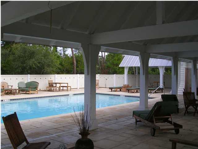 Lot 2 Pinewood Ln Inlet Beach Inlet Beach, FL 32461 - Photo 4 of 5 a living room with furniture and a floor to ceiling window