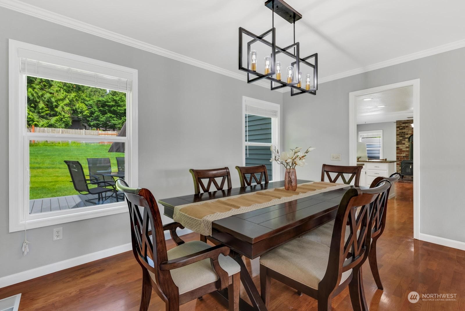 17218 3rd Avenue Southeast Bothell, WA 98012 - Photo 11 of 28 a view of a dining room with furniture window and wooden floor