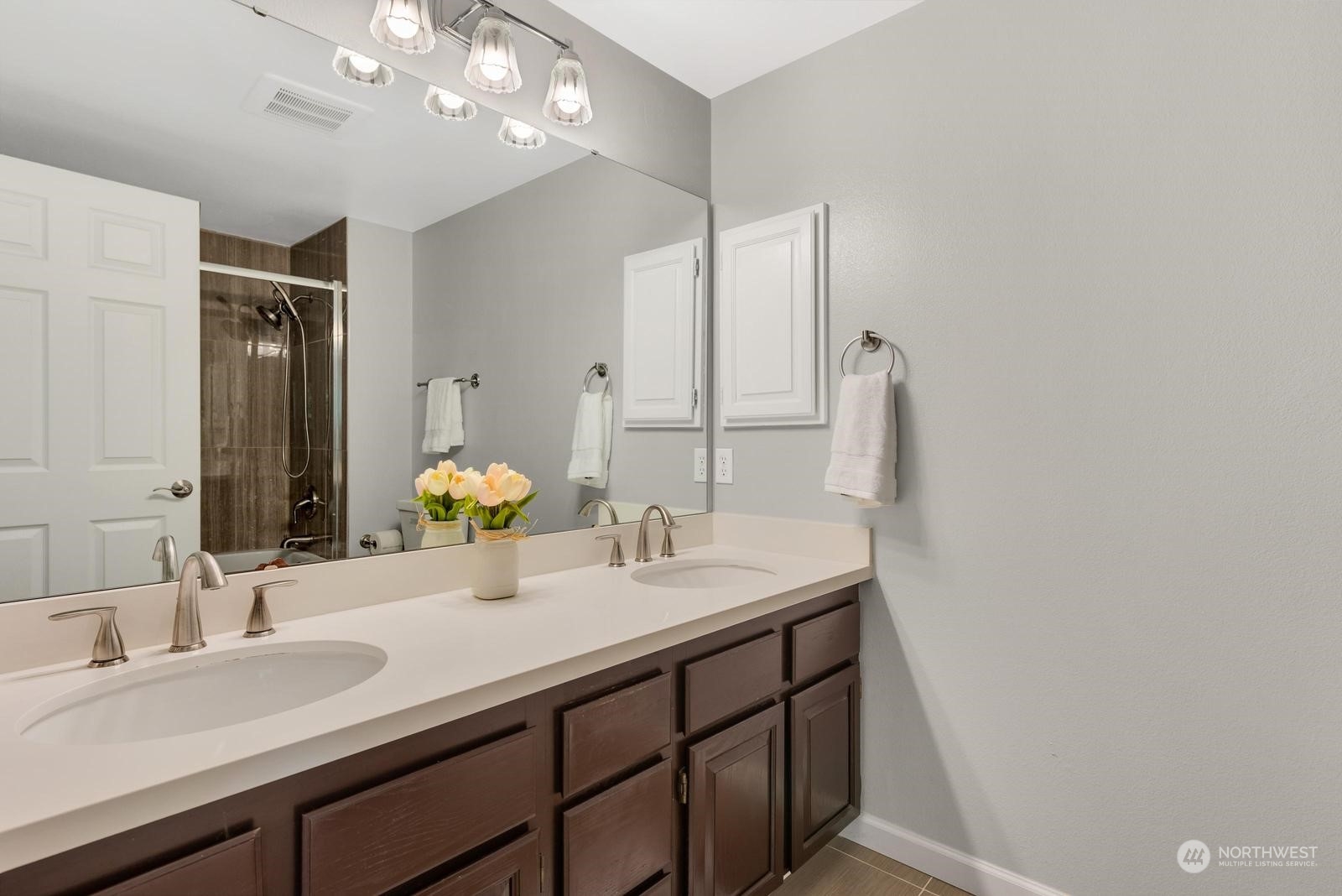 17218 3rd Avenue Southeast Bothell, WA 98012 - Photo 18 of 28 a bathroom with a double vanity sink and a mirror