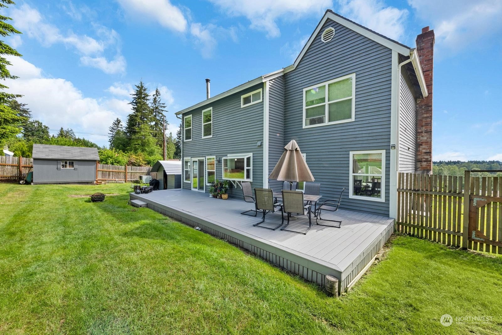 17218 3rd Avenue Southeast Bothell, WA 98012 - Photo 23 of 28 a view of a house with backyard and sitting area