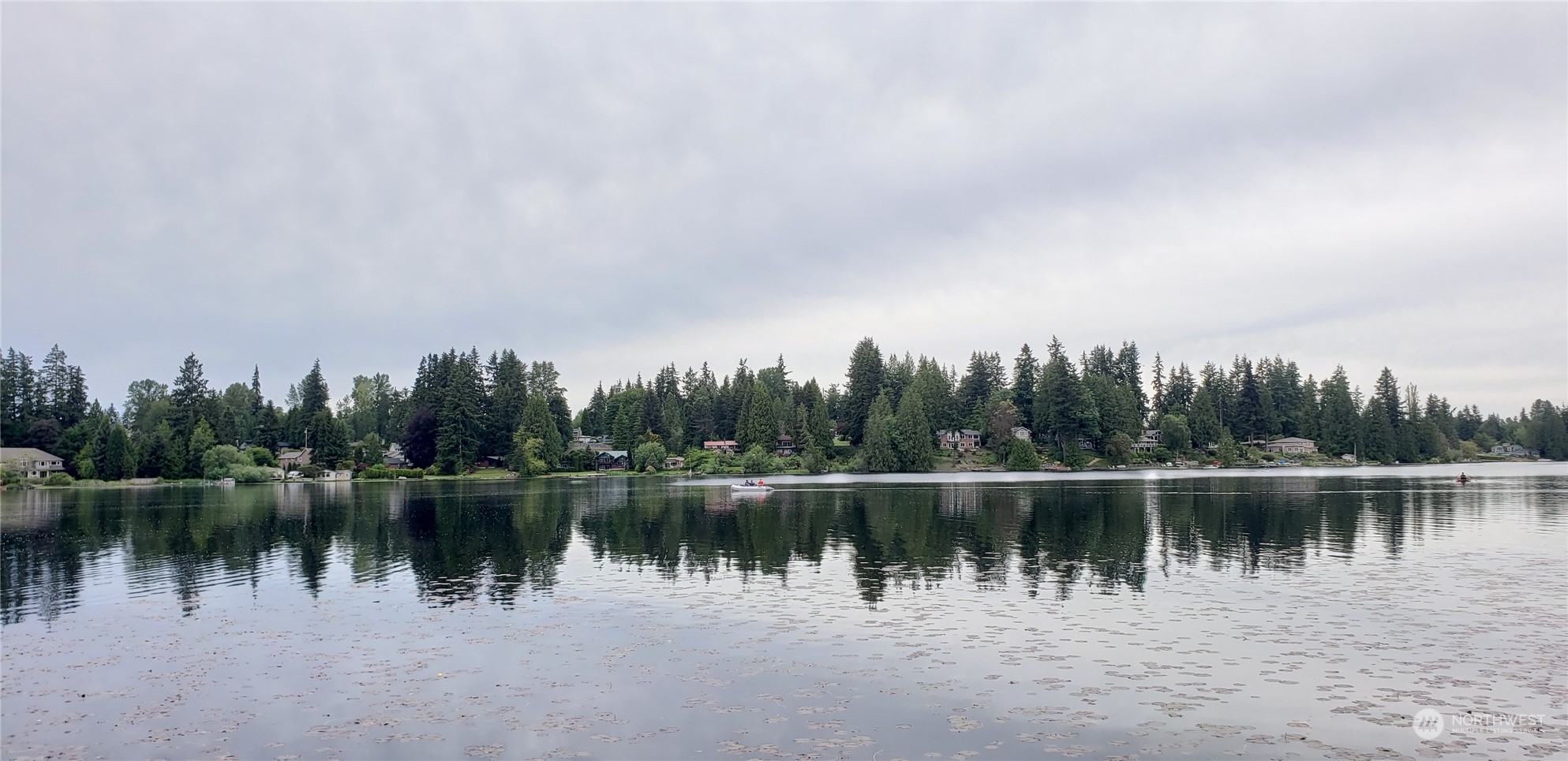 17218 3rd Avenue Southeast Bothell, WA 98012 - Photo 27 of 28 a lake view with a city skyline in the background
