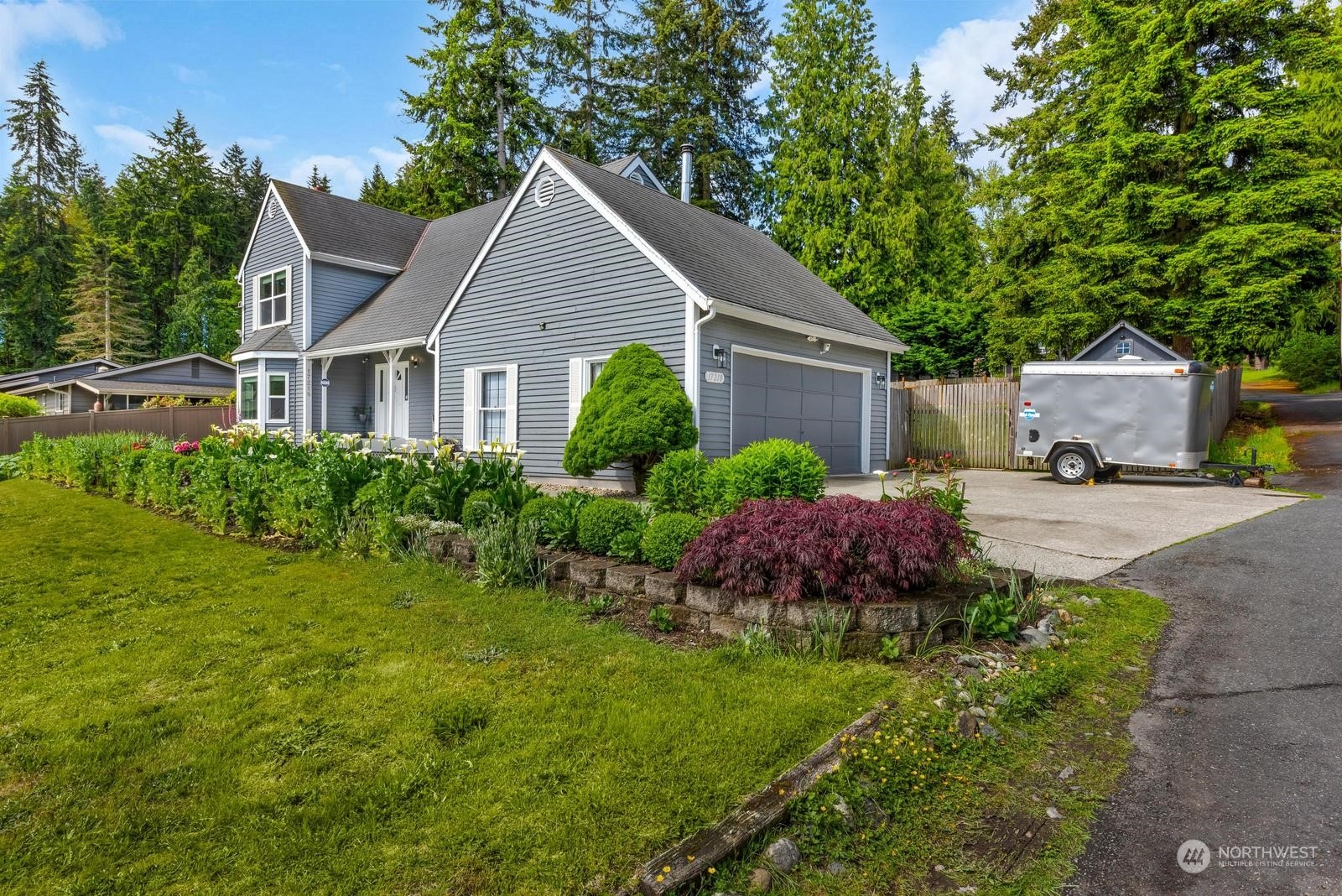 17218 3rd Avenue Southeast Bothell, WA 98012 - Photo 3 of 28 a front view of house with yard and green space