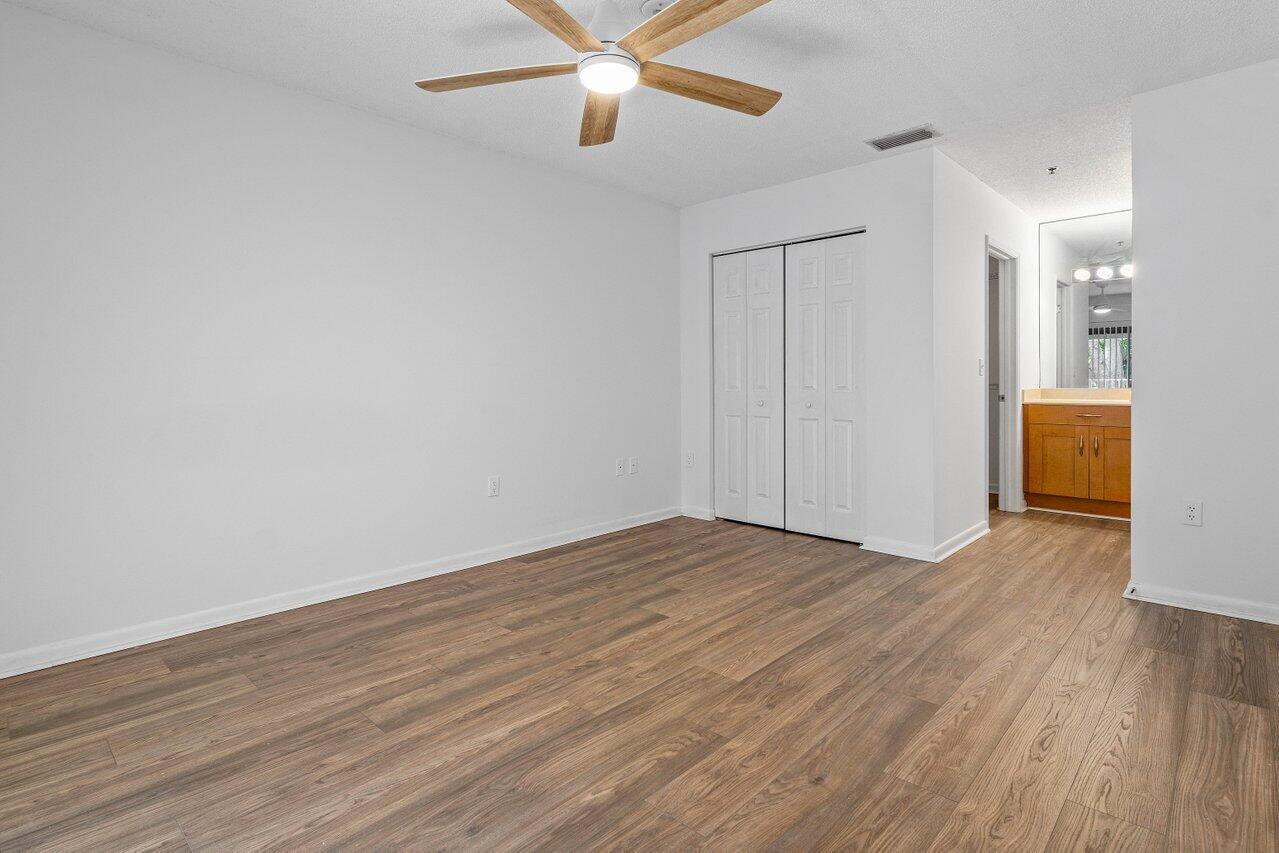 3299 Clint Moore Road, Unit 207 Boca Raton, FL 33496 - Photo 15 of 32 Primary bedroom