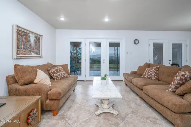 a living room with furniture and a couch