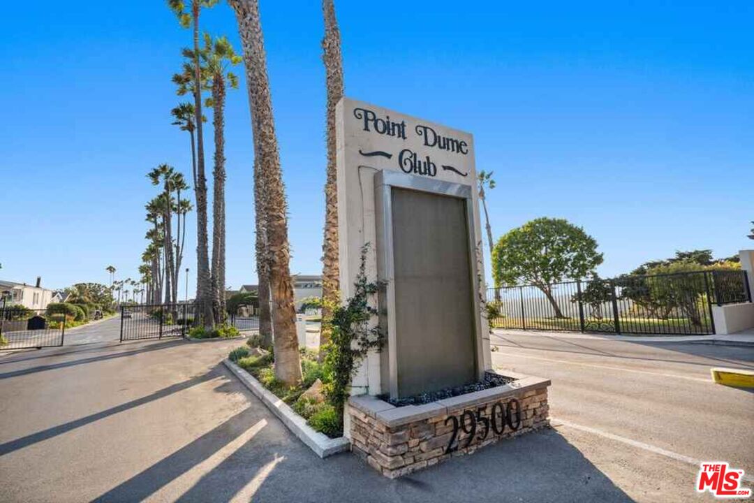 29500 Heathercliff Road, Unit 5 Malibu, CA 90265 - Photo 10 of 17 a view of a building with sitting area