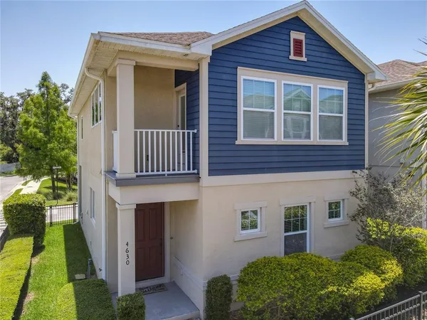 a view of a city with a building in the background