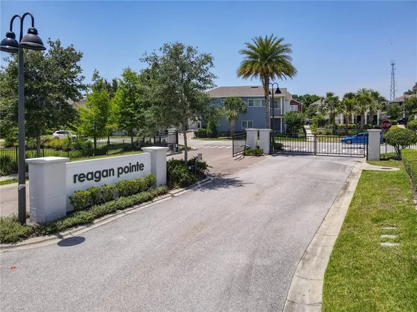 a view of a dining room with furniture wooden floor and chandelier