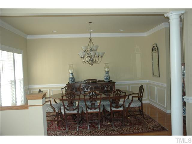 10702 Friendly Neighbor Lane Raleigh, NC 27614 - Photo 4 of 25 Dining room that will accommodate large furntiure and offers butler's service area for convenience. Dining Room