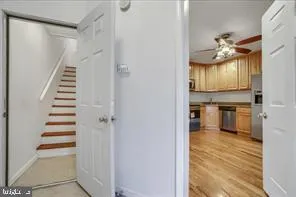 a view of an entryway with wooden floor