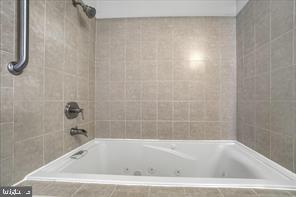 1217 North 65th Street, Unit 1 Philadelphia, PA 19151 - Photo 7 of 9 a bathroom with a bathtub