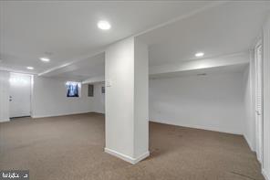 1217 North 65th Street, Unit 1 Philadelphia, PA 19151 - Photo 8 of 9 an empty room with windows